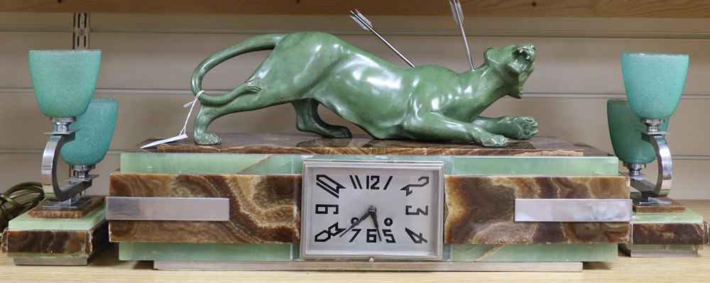 An Art Deco clock onyx and bronze tiger clock garniture, length 59cm
